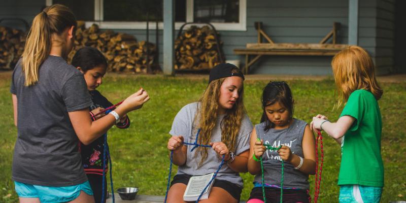 campers learning how to tie knots at honeyrock