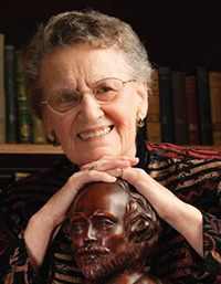 photo of past professor beatrice batson with Shakespeare bust