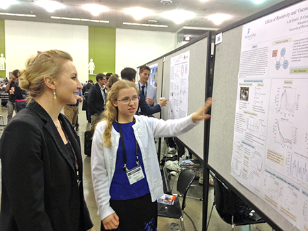 Wheaton College Physics Student April Futch presenting her research at the APS-DPP meeting in San Jose, CA.