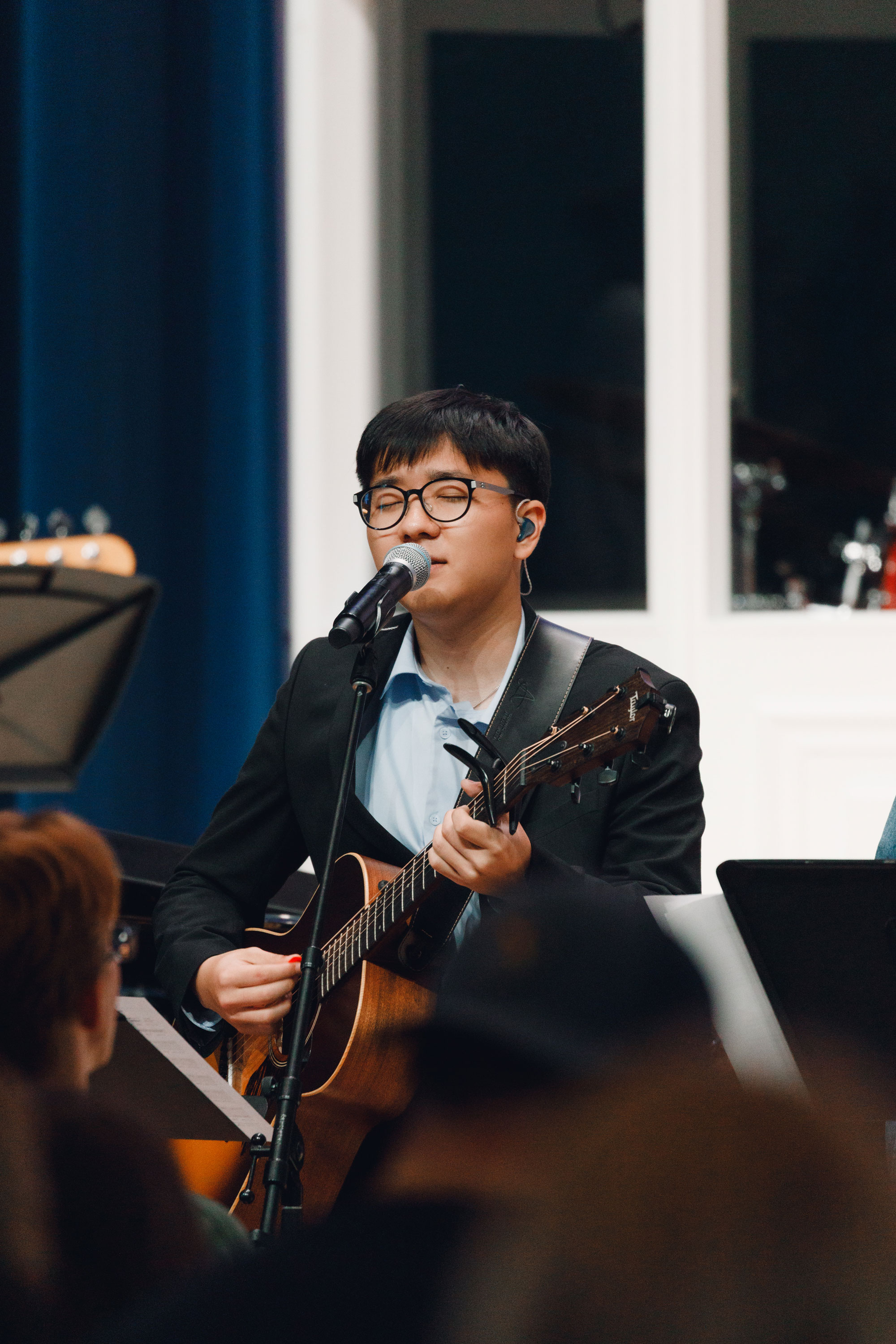 Wheaton Student Leading Chapel Worship with Guitar
