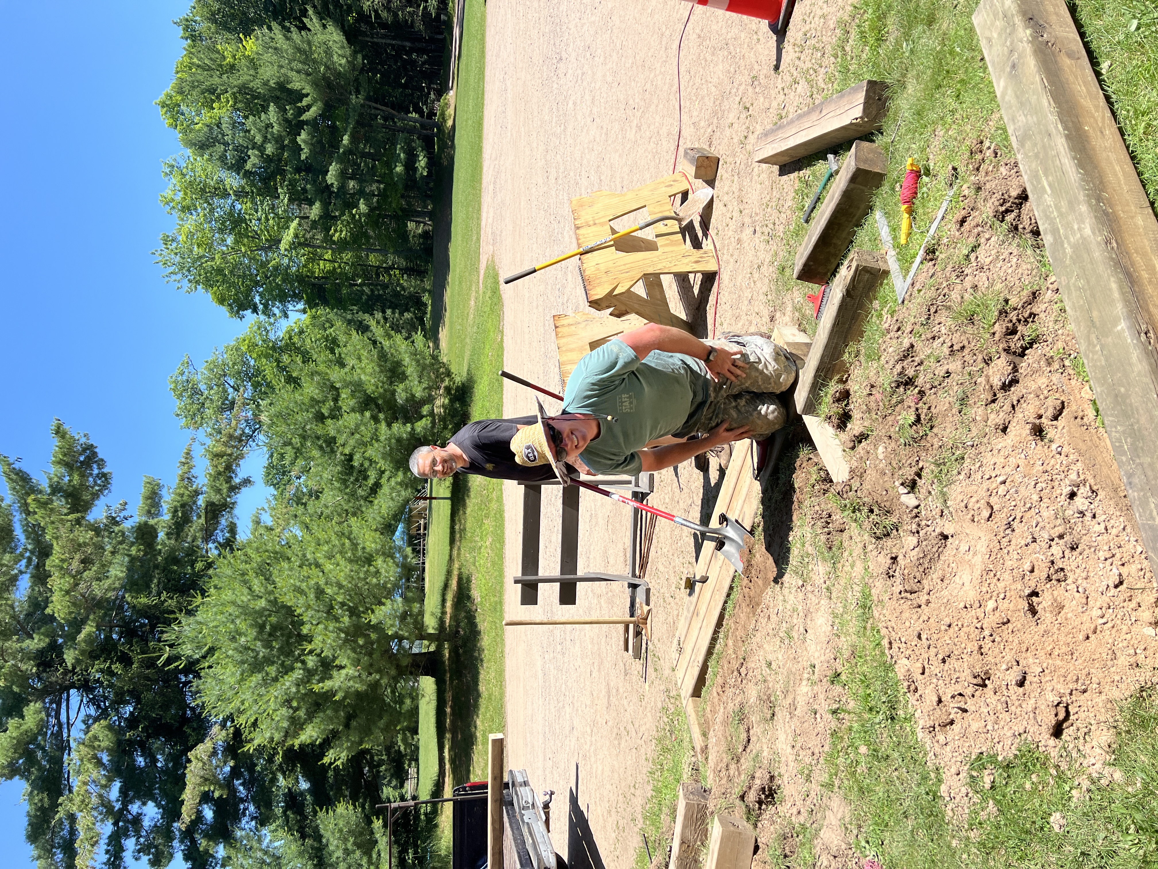Two men building stairs at honeyrock
