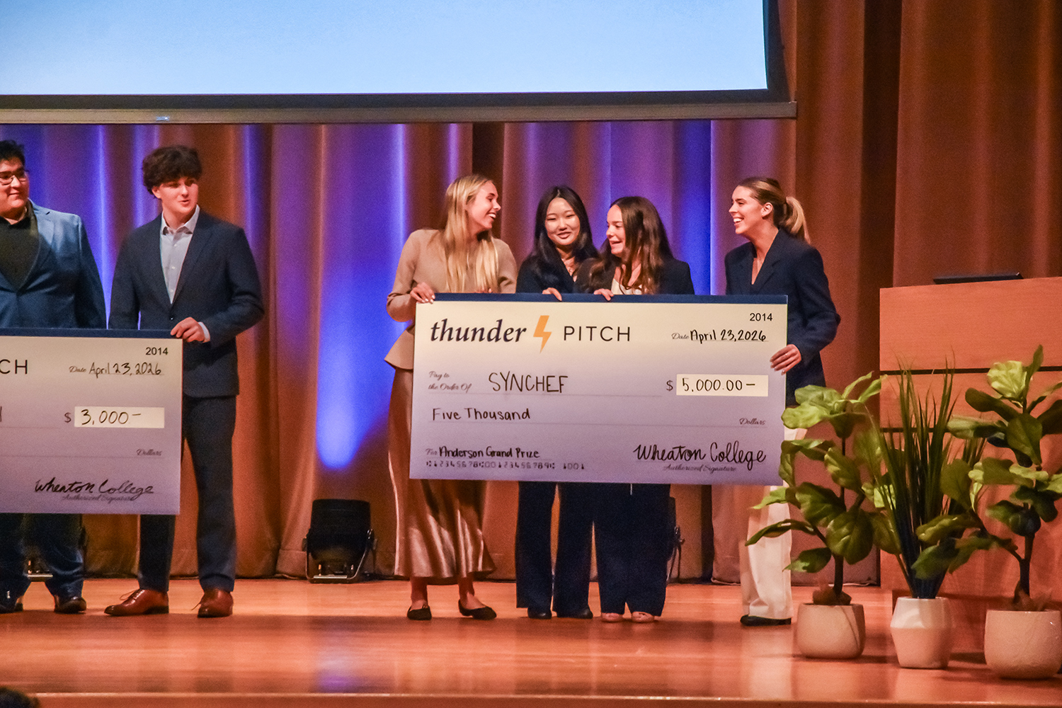 winners with large checks