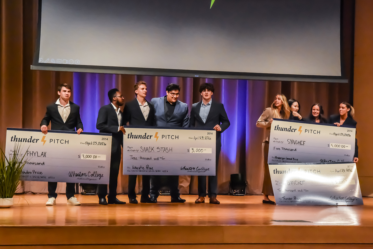 winners with large checks