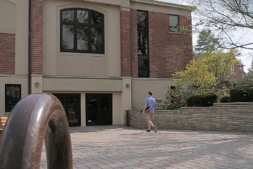 Student Walking into Todd M. Beamer Student Center at Wheaton College Student Walking into Todd M. Beamer Student Center at Wheaton College