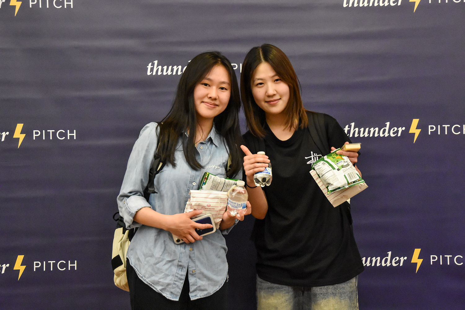 students in front of TP background