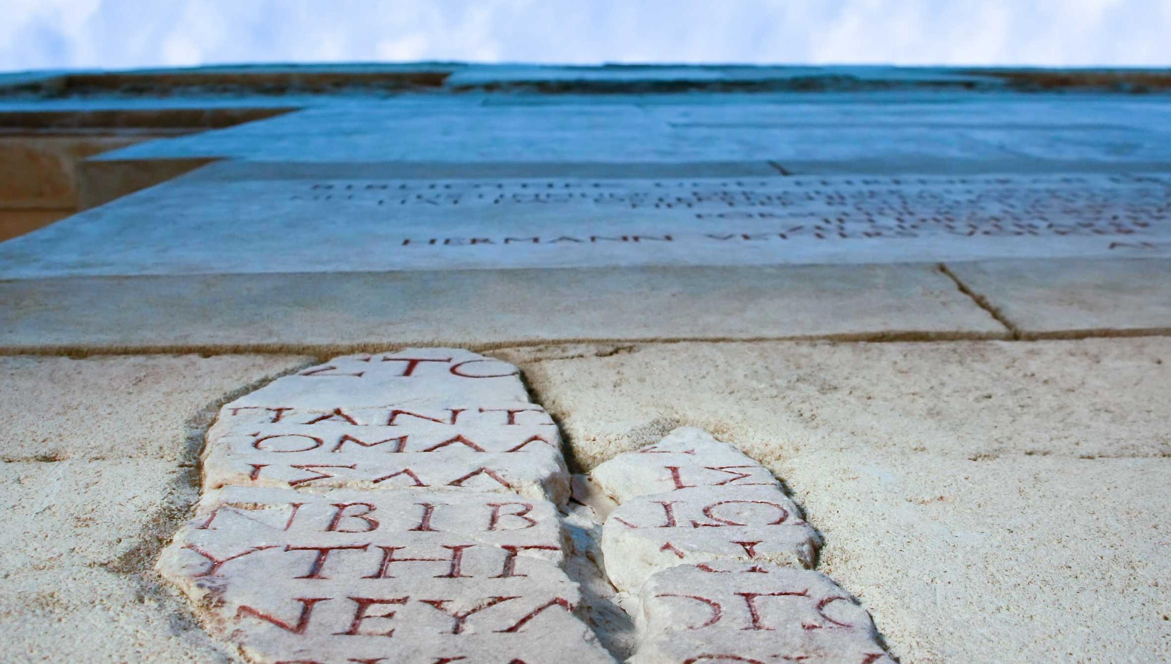 Ancient-Greek-Inscription-iStock-163993222-2362x1340