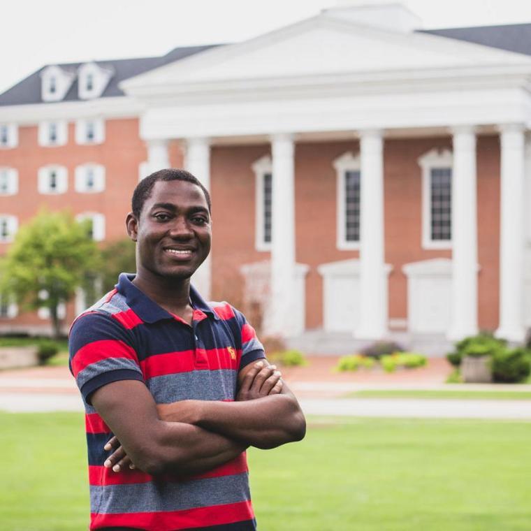Wheaton Graduate Student in front of Billy Graham Center