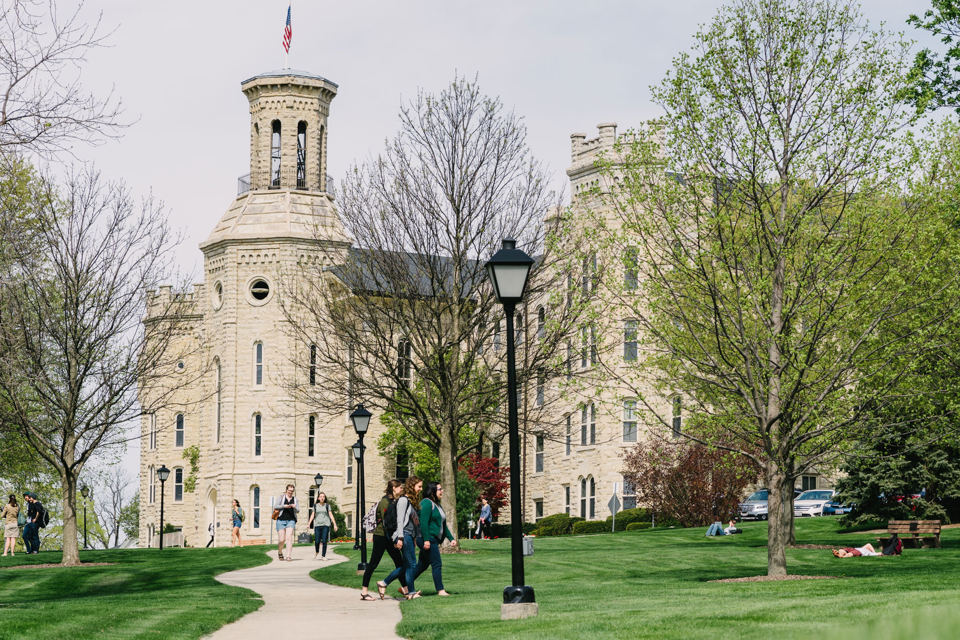 Blanchard Hall with students walking on Wheaton College Campus