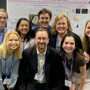 Chemistry Students and Faculty with Research Display