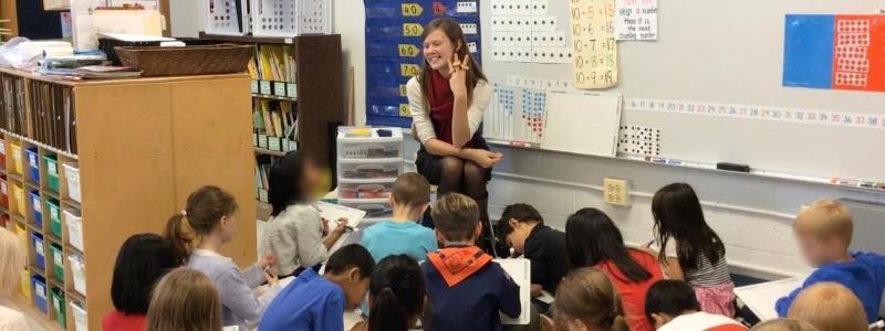 teacher reading to her class