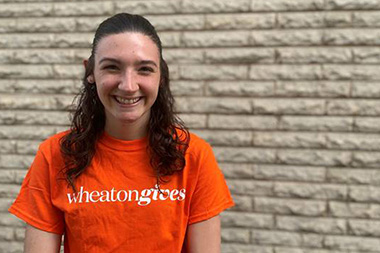 Student Leah Martin with WheatonGives Shirt