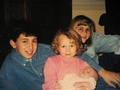 Sisters Emily and Meredith (MA '19 and BA '19) with their siblings