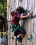 student-on-climbing-wall at HoneyRock