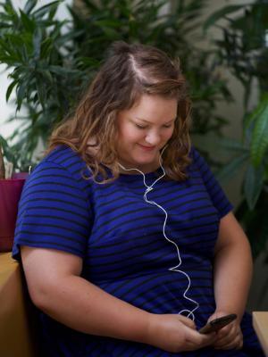 Amy Smith listening to headphones