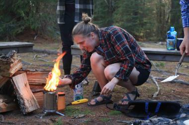 olivia works with a stove on trip