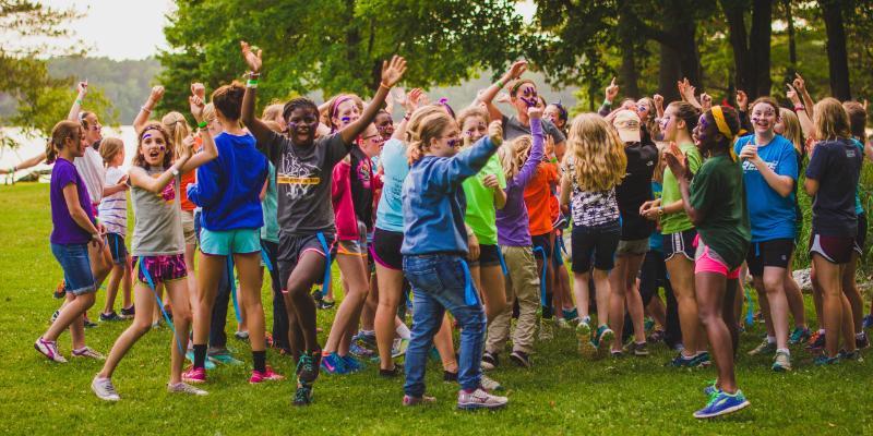 residential camp girls celebrating at honeyrock