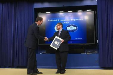 Jamie Aten Accepting FEMA Award in Washington DC