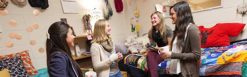 Girls Chatting in Residence Hall 