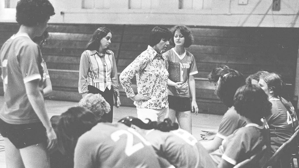 Coach Marilyn Scribner hon speaking to Wheaton College IL womens volleyball team