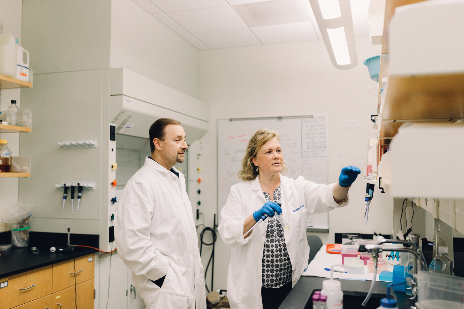 Wheaton College IL Professors Drs. Lisa and Dan Burden in Lab