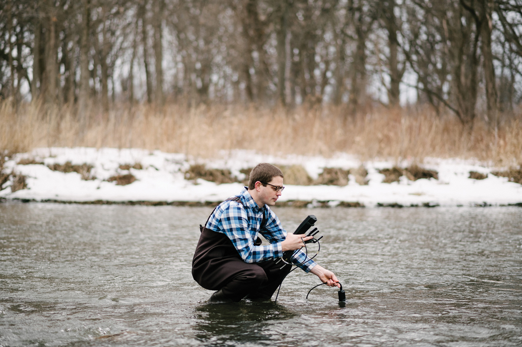 Wheaton College IL Prof Dr. Andrew Luhmann ’06 Examining Wintery River