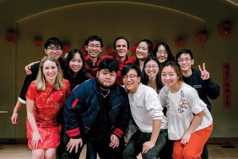 Wheaton College IL Student performers pose for a photo after the Lunar New Year celebration in Coray Gym