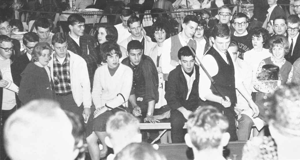 1964, Students gather to watch the bumper pool playoffs at the Campus Fair.
