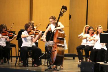 Wheaton College IL Conservatory of Music alumna Hannah Novak plays bass in orchestra