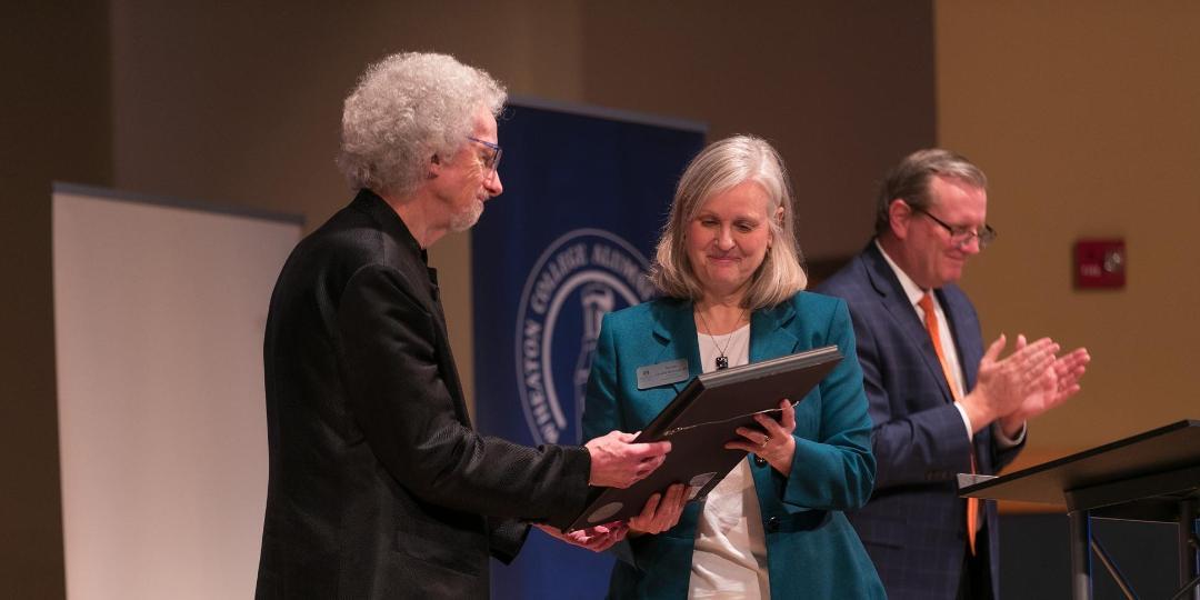 1080x540 Philip Yancey receives award from Beverly Hancock