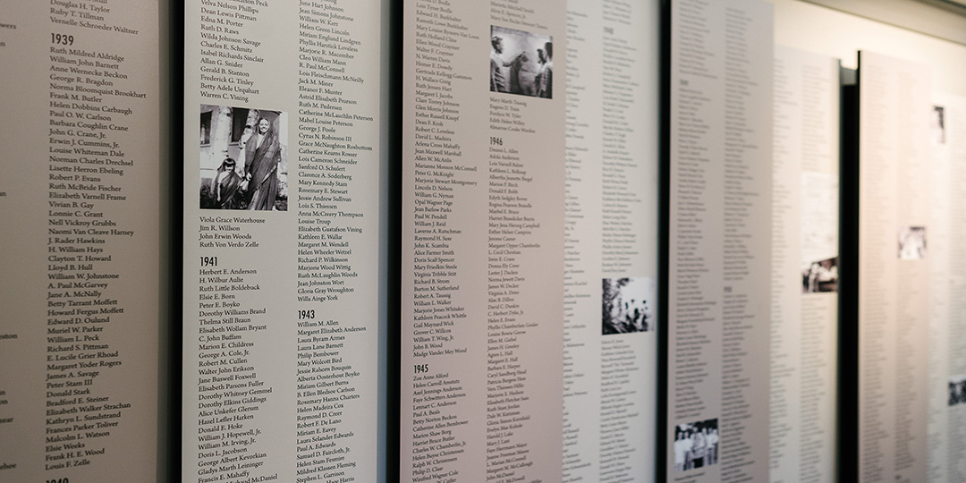 1080x540 tan display listing names of missionaries in Blanchard hallway