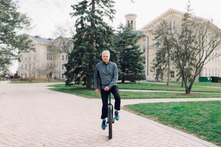 Wheaton College IL Bob O'Connor Philosophy Professor on a Unicycle