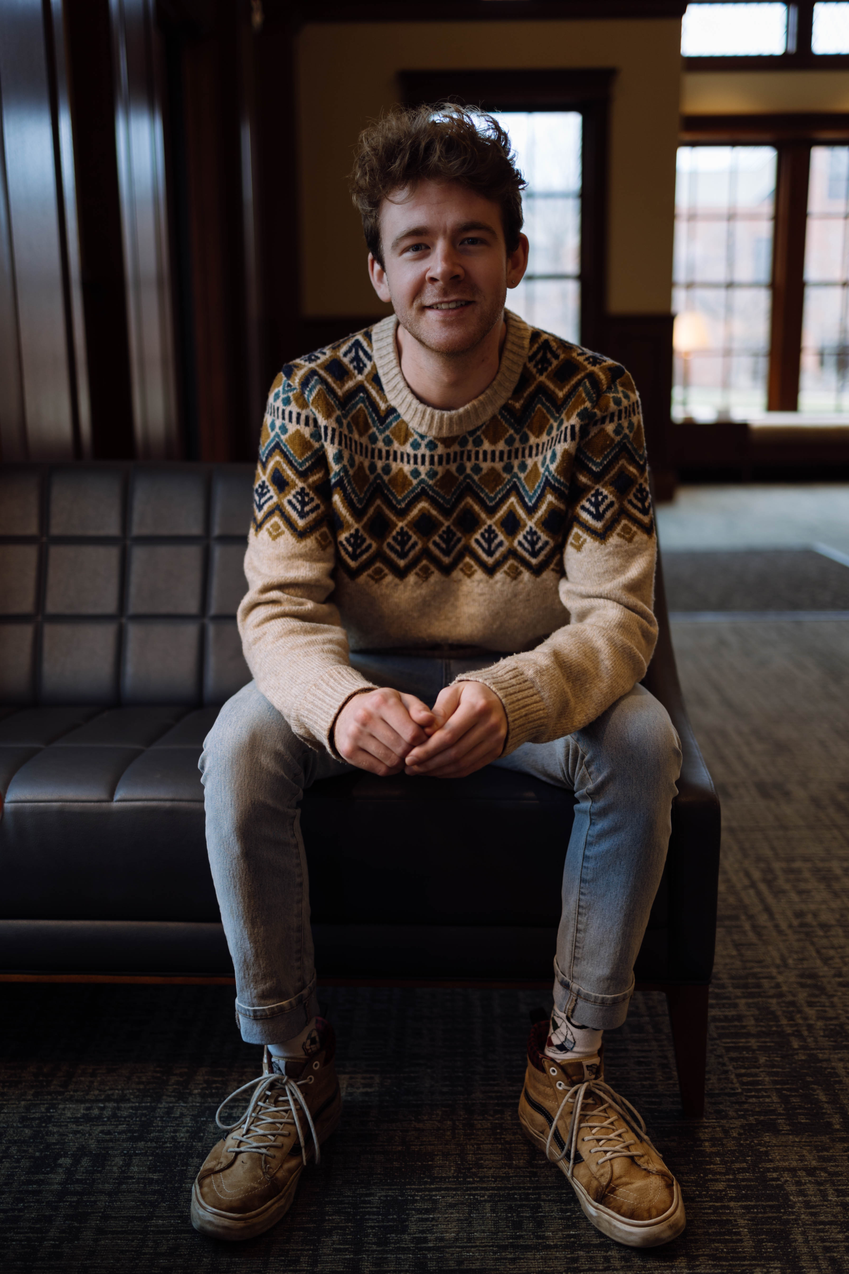 Wheaton College IL Undergraduate Student Josh Winnes in the Melvin E. Banks Welcome Center