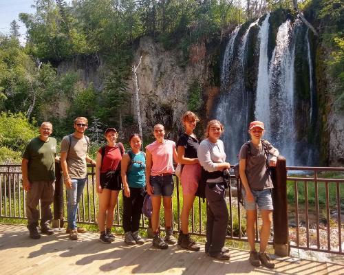Wheaton Sustainability Certificate Students near Waterfall