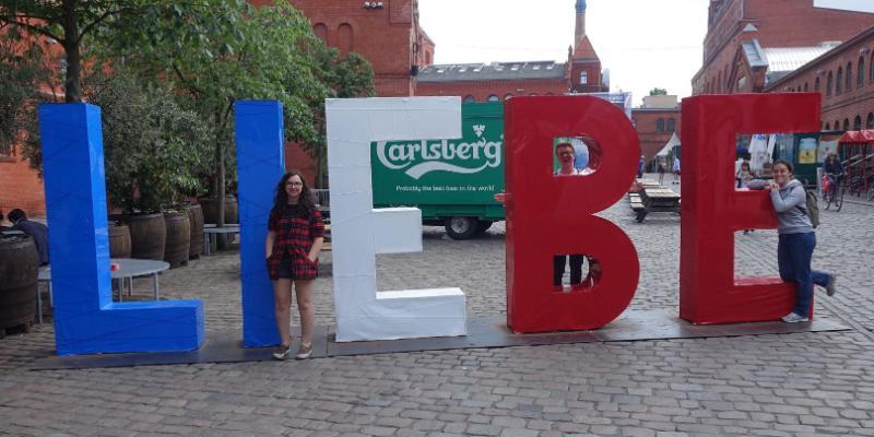 Wheaton in Germany Students in front of LIEBE sign