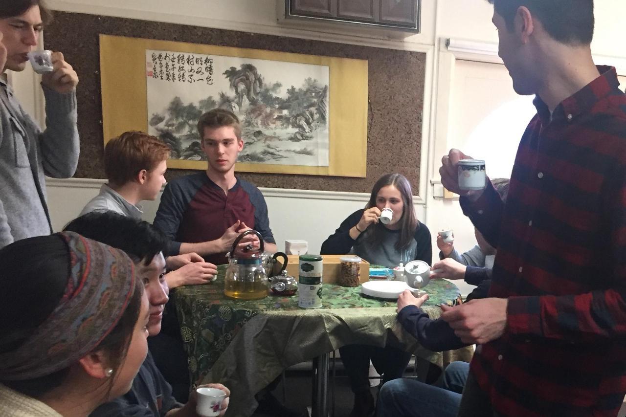 Students enjoy Chinese tea and conversation in Wang Laoshi's office 