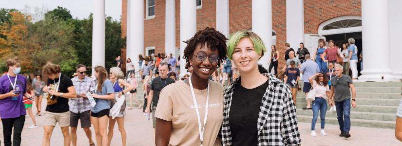 Two female students outside of Edman 825 x 300 