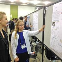 Physics Student Presenting Research Findings