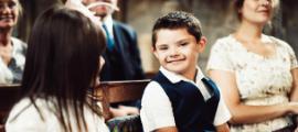 Special Ed child sitting on church pew