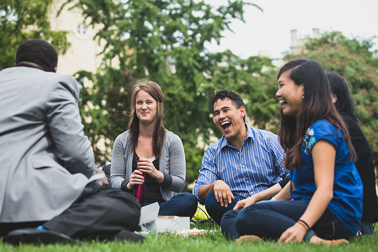 photo of grad students on lawn